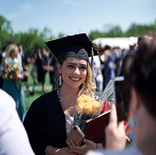 Graduate with flowers